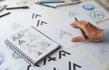 Graphic designer creative design sketch drawing logo Trademark brand Workspace - obrazy, fototapety, plakaty