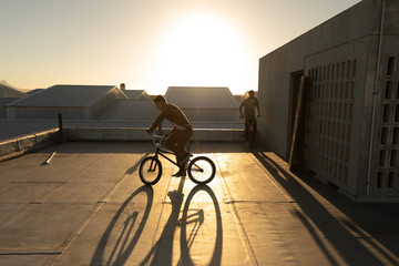 BMX riders on a rooftop