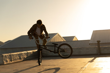 BMX rider on a rooftop