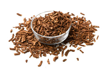 Dried medicinal herbs raw materials isolated on white. Root of Taraxacum