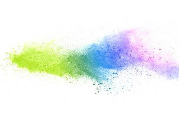 Explosion of colored powder on white background