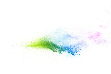 Freeze motion of colorful color powder exploding on white background.  Paint Holi.