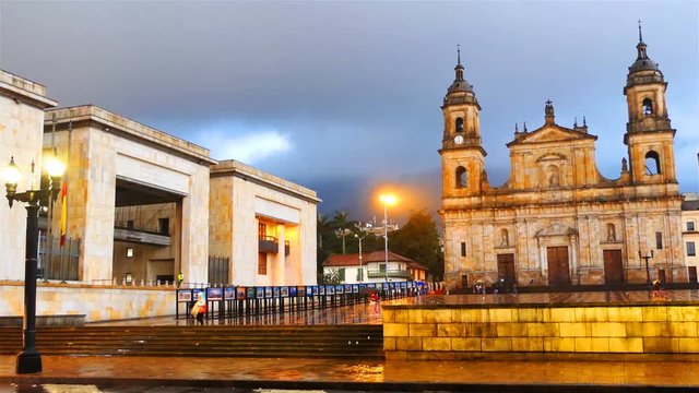 Timelapse from day to night at Bolivar's Plaza of Bogota Colombia. Primatial Cathedral and justice palace Bogota at rainy day time lapse. Wide Angle Shot Of Bolivar's Plaza 4k. The center of Bogot&aacute;