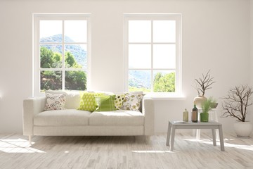 Stylish room in white color with sofa and summer landscape in window. Scandinavian interior design. 3D illustration