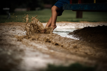 splashing in a puddle