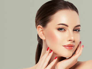 Beautiful woman face healthy skin manicure nails natural makeup beauty cosmetic concept