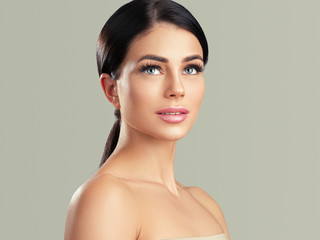 Beautiful woman beauty hair and skin natural make up cosmetic concept 