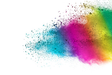 Freeze motion of colorful color powder exploding on white background.  Paint Holi.