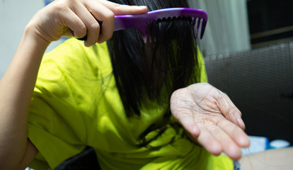 women Hair Loss When combing hair
