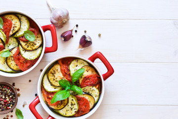 Village dinner - baked vegetables with olive oil and spices. Ratatouille.