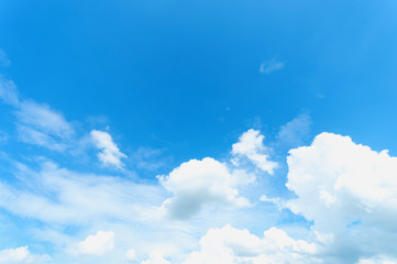 Blue sky with white clouds floating in the sky.