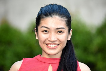 A Smiling Youthful Asian Female © dtiberio