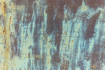 texture of rusty painted metal. several layers of paint. corrosion of metal