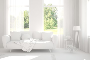 Mock up of stylish room in white color with sofa and green landscape in window. Scandinavian interior design. 3D illustration