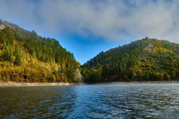 Autumn lake in Kamchatka among the mountains and forests. the nature of Kamchatka