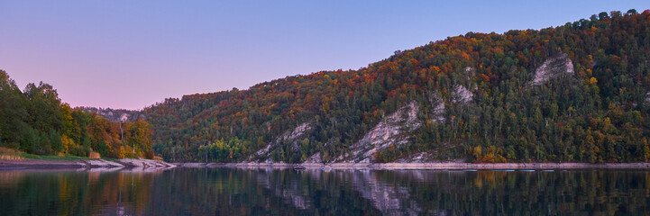 Autumn landscape of lake and mountains at sunset. Sweden