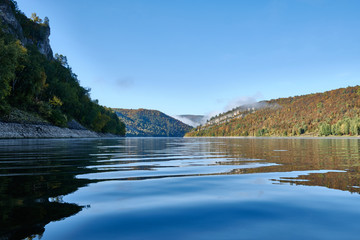 Naklejka premium Foggy landscape in autumn on a lake in Norway in the mountains.
