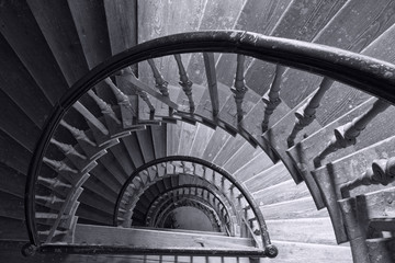 Old antique staircase in black and white.