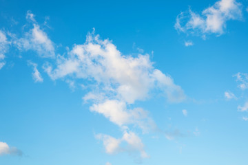 Naklejka na ściany i meble Blue sky background with cumulus clouds.