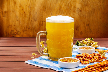 Oktoberfest set. Light beer, pretzels, mustard, sesame straw, hop.