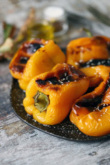 Roasted peppers paprika. Grilled yellow paprika. Autumn dish. Vegan snack. Selective focus. Macro.