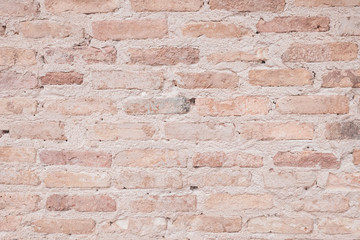Old grunge brown stone brick wall texture abstract background.