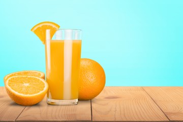 Orange juice and slices of orange on background © BillionPhotos.com