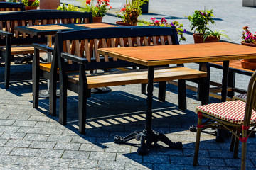 Chairs and tables in a cozy street cafe