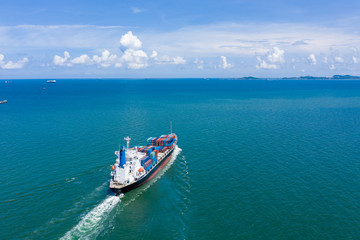 business and industry import and export service shipping cargo containers international by the sea aerial view