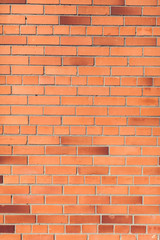 Red bricks background. A part of wall of the building