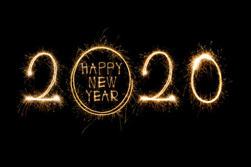 Happy New Year 2020. Creative text Happy New Year 2020 written sparkling sparklers isolated on black background for design，Merry Christmas