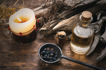 Magic potion bottles on a wizard table. Herbal medicine with dried ingredients on the table...