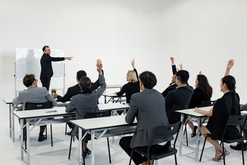 Meeting and planning of working as a team together of Asian people and foreigners.