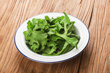 a plate of fresh Ice grass salad，