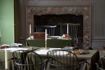 Old wooden chairs - writing desks with books and candles