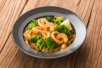 a bowl of hearty seafood noodles