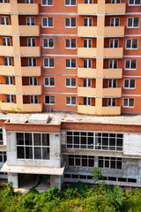 Naklejka premium High-rise residential building close-up.