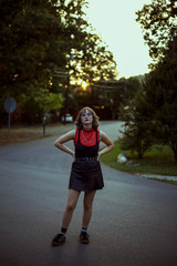 Young woman standing outside during golden hour 