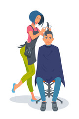 A woman hairdresser cuts the young man's hair. 