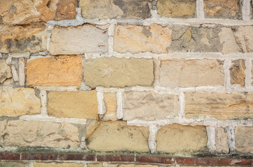 aged yellow brick wall