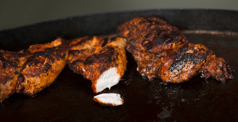 Close up of hot and tasty meat preparing on grill