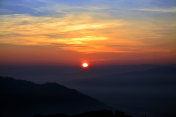 morning with fog over the village