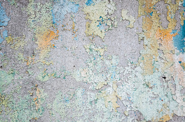 Obraz na płótnie Canvas wall with colorful dirty cracked texture