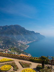 Italy, april 2019: Beautiful scenic picture-postcard view of famous Amalfi Coast with Gulf of Salerno from Villa Rufolo gardens in Ravello, Campania