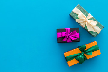 frame from boxes with presents on blue background top view mockup