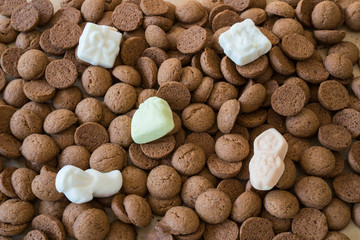 Heaps kruidnoten, ginger nuts, with candy. Traditional candy for Dutch event Sinterklaas