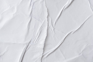 Blank white crumpled and creased paper poster texture background