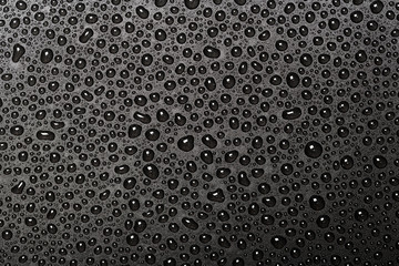 abstract water drops on a dark black  background