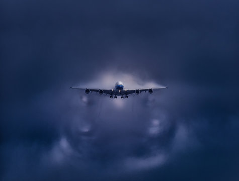 a jet is moving through the sky and clouds