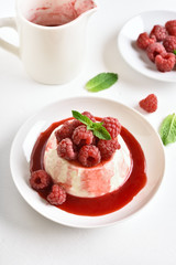 Panna cotta with fresh raspberries
